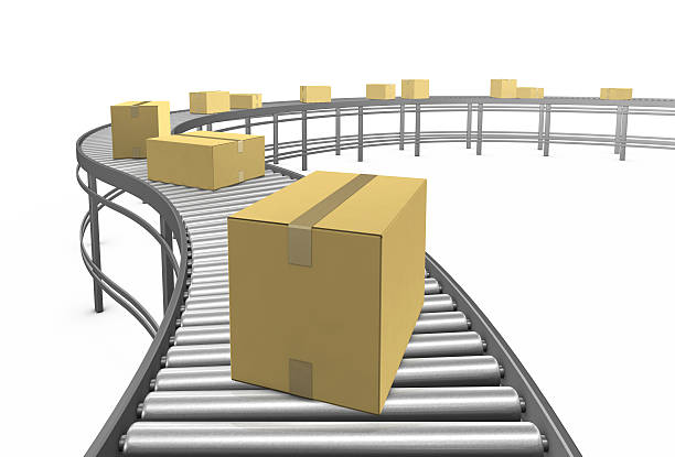 Cardboard boxes on a metal conveyor belt